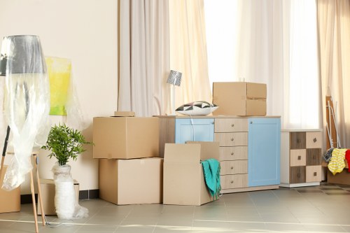 Small removals van loading household items in Westnorwood