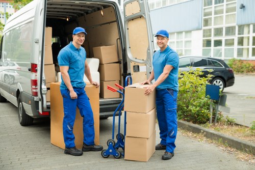 Professional movers handling furniture during removals in Westnorwood